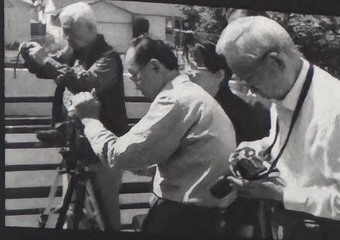 Photographers at work by Li Xinshi